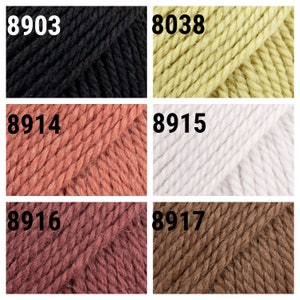 May include: Six skeins of yarn in different colors: black, yellow, coral, white, rose, and brown. The yarn skeins are labeled with numbers: 8903, 8038, 8914, 8915, 8916, and 8917.