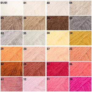 May include: A grid of twenty-four square swatches of fuzzy, mohair-style yarn in various colors, including shades of white, beige, brown, gray, yellow, orange, pink, and red. Each swatch is labeled with a unique numerical identifier in the corner.