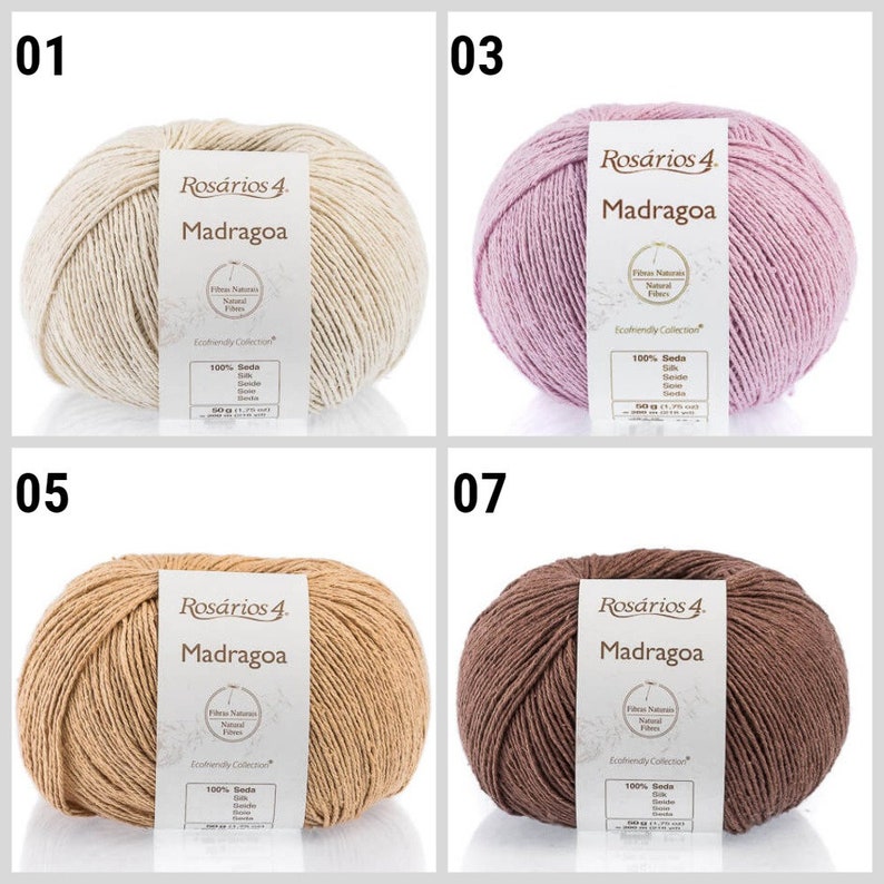 May include: Four skeins of yarn in different colors: beige, pink, light brown, and brown. Each skein has a label that reads "Ros&aacute;rios 4 Madragoa" and includes information about the yarn's composition and origin.