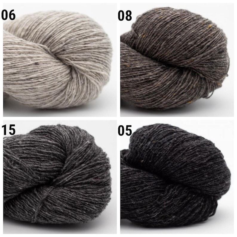 May include: Four skeins of yarn in different colors: light beige, dark brown, dark gray, and black. The yarn is textured and has a subtle fleck.