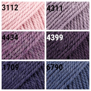 May include: Six skeins of yarn in different shades of pink, purple, and blue. The skeins are labeled with numbers: 3112, 4311, 4434, 4399, 1709, and 6790.