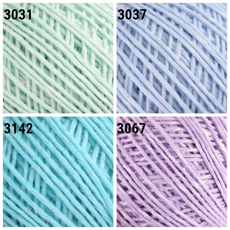 May include: Four skeins of cotton yarn in different colors: light green, light blue, turquoise blue, and lavender. The skeins are labeled with numbers: 3031, 3037, 3142, and 3067.