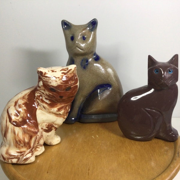 Choice of cat figurines: Beaumont Brothers pottery cat, swirled clay cat, or Brown Dolomite Peruvian spirit totem.