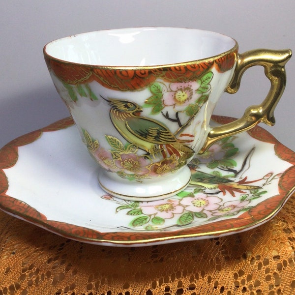 Two sets of 5 hand painted phoenix sparrow cherry blossom tea cups & saucers. Made in Japan.  Rich colors. Intricate design.  Gold accents.