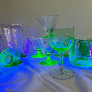 Choice of Uranium glass sherbert, parfait glasses, sugar creamer or small goblet. All glow under black light.