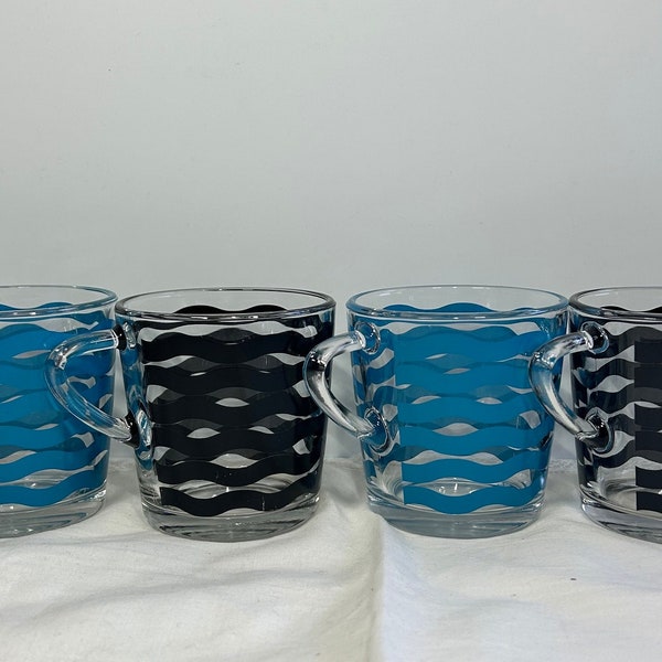 Set of 4 Ikea Glass Cups With Black and bright Blue Waves design.  Made in France. Excellent condition.  Glass coffe mug.