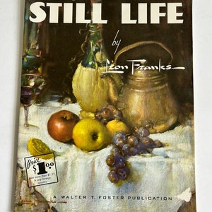 May include: A book cover with a painting of a still life featuring a copper kettle, a bottle of wine, grapes, apples, and a white tablecloth. The title of the book is "How to do STILL LIFE by Leon Franks".