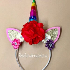 Unicorn headbands with flowers and unicorn ears. White headband for girls with rainbow unicorn horn and pink and gold ears