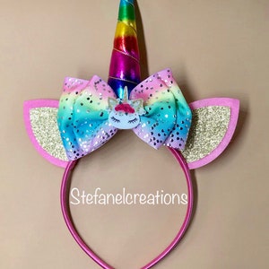 Unicorn headbands with flowers and unicorn ears. White headband for girls with rainbow unicorn horn and pink and gold ears