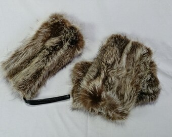 Raccoon muff, leg warmers