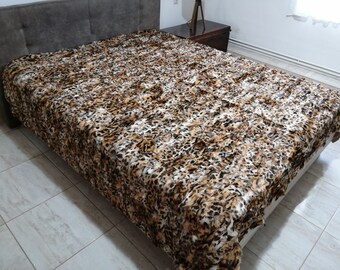 Animal print bed cover goat fur