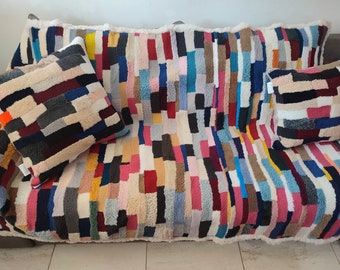 Set of rainbow sheepskin throw / carpet and pillow cases