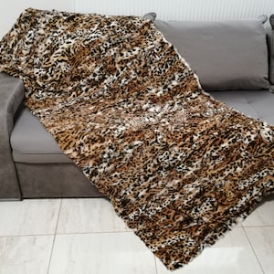 Rabbit fur animal print throw / carpet