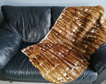 Animal print fur throw and carpet goat