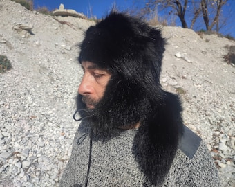Raccoon trapper hat with tail
