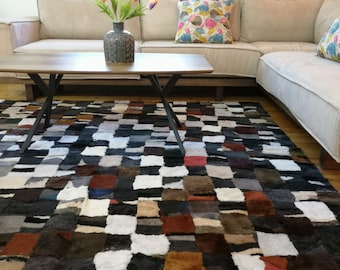 Rainbow fur carpet or throw of sheepskin