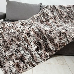 Rabbit fur animal print throw / carpet