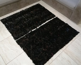 Real fur throw and carpet with flowers/branches motif