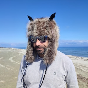 Raccoon fur trapper hat with ears and tail