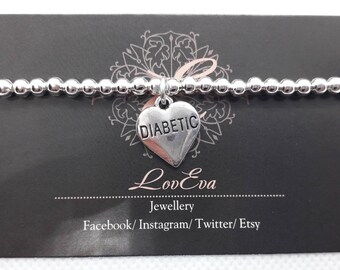 Silver bead bracelet with diabetic charm by LovEva.