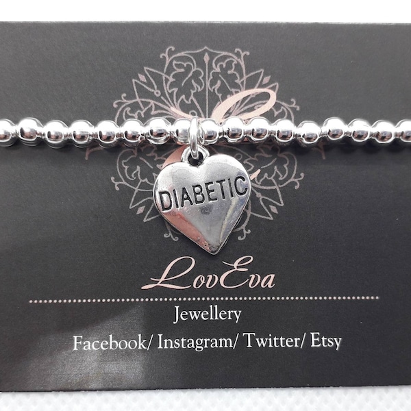 Silver bead bracelet with diabetic charm by LovEva.