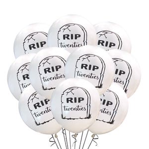 May include: A bunch of white latex balloons with black RIP twenties printed on them. The balloons are shaped like tombstones.