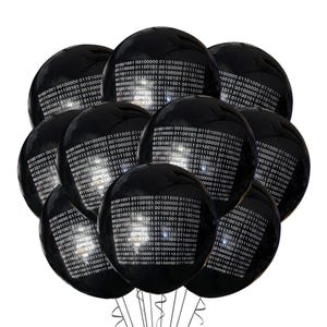 May include: A cluster of black balloons with white binary code printed on them. The balloons are tied together with silver strings.