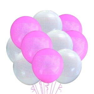 May include: A bunch of pink and white balloons with a binary code pattern printed on them. The balloons are tied together with pink ribbons.