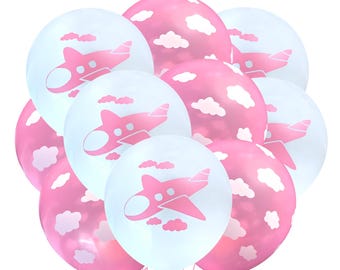 May include: A bunch of pink and white balloons with a plane and clouds design. The balloons are tied together with a pink ribbon.