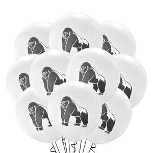 May include: A cluster of white balloons, each printed with a black gorilla illustration. The balloons are arranged together, creating a playful and eye-catching display. Perfect for a jungle or animal-themed party.