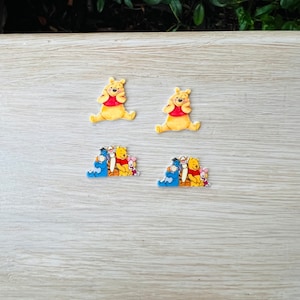 May include: A set of three ceramic mugs with a speckled, matte finish. The mugs are in shades of cream, light gray, and dark gray. Each mug has a simple, minimalist design, perfect for coffee or tea.