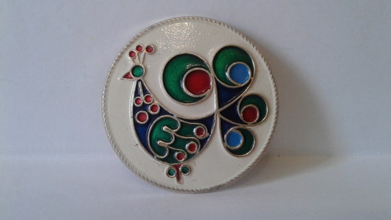 Pin. Icon Peacock. Collectible badge. Round badge