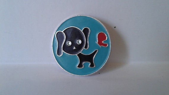 Pin. Collectible badge. Puppy and butterfly. Round