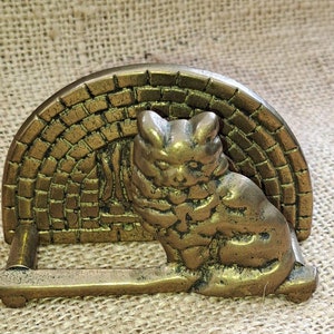 Portatovaglioli in ottone con gatto