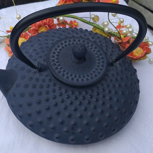 Black cast iron tea kettle