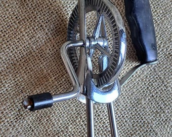 Vintage handmixer met slinger, circa jaren 70.