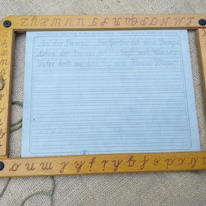 Older blackboard blackboard with wooden frame