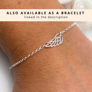 May include: A silver chain bracelet with a delicate wing charm. The bracelet is on a person's wrist. ALSO AVAILABLE AS A BRACELET linked in the description.