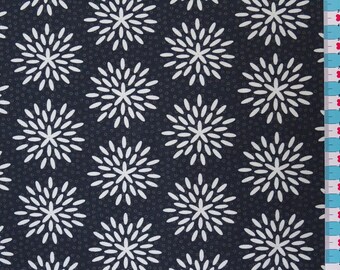 May include: A dark blue fabric with a white repeating pattern of stylised flowers. The fabric has a subtle texture.