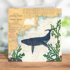 May include: An illustration of a blue whale on a nautical chart background with green seaweed. The chart shows the area from Lizard Point to Berry Head, English Channel. The text "Depths in Metres" is visible.