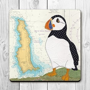 Dessous de verre macareux à Lundy North Devon par Hannah Wisdom Textiles | Thèmes côtiers sur d'anciennes cartes marines