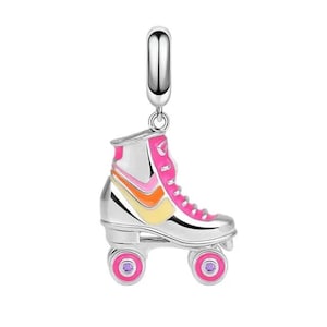 May include: Silver charm in the shape of a pink, orange and yellow roller skate with purple gem accents.