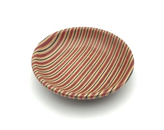 Decorative bowl made from recycled skateboards