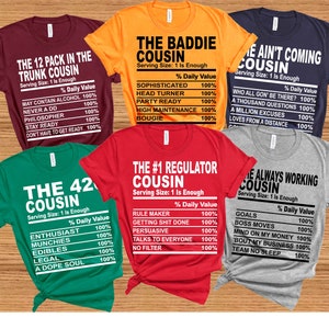 May include: Six different t-shirts with a nutrition label design. Each shirt has a different title and description about being a cousin. The titles include "The 12 Pack in the Trunk Cousin", "The Baddie Cousin", "The #1 Regulator Cousin", "The 42 Cousin", "Ain't Coming Cousin", and "Always Working Cousin".
