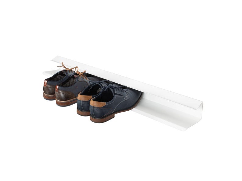 Peut inclure: Un porte-chaussures blanc avec deux paires de chaussures, une paire est noire et l'autre est marron.