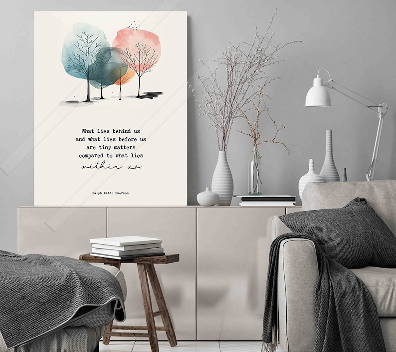 May include: A watercolor painting of three trees with a quote by Ralph Waldo Emerson: "What lies behind us and what lies before us are tiny matters compared to what lies within us."