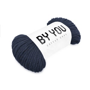 May include: A roll of dark blue cotton cord labelled "BY YOU COTTON CORD".