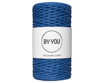 May include: A spool of blue macrame cord with a white label that says "BY YOU MACRAME CORD".