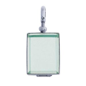 May include: A rectangular pendant with a light green gemstone set in a silver-colored metal frame. The pendant has a bail at the top for attaching to a chain. The gemstone is a rectangular shape.