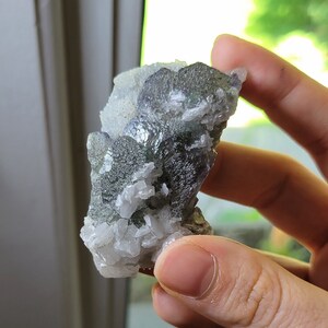 Stepped fluorite x UV reactive calcite- Xianghualing Mine, Hunan, China
